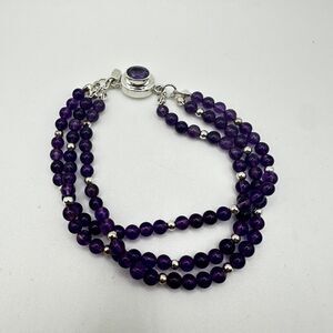 Stunning 3-stranded Amethyst and sterling silver bracelet with unique clasp!